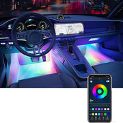 Car interior with RGB lighting effects and a smartphone displaying a color wheel app.